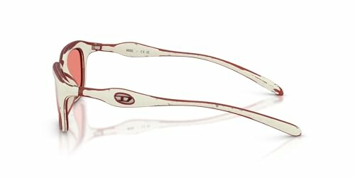 Side view of red sunglasses with tinted lenses.