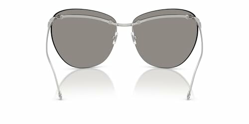 A pair of stylish silver sunglasses with dark lenses.